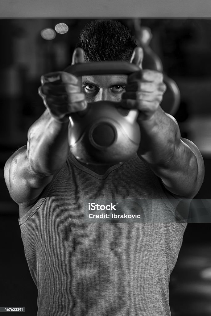 Kettle Bell Workout Young Muscular Men Doing Swing Exercise With Kettlebell 20-29 Years Stock Photo