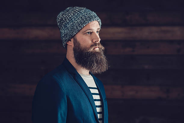 istock Side View of a Goatee Man with Bonnet Facing Right 467624512