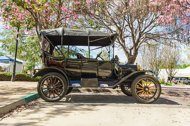 Ford Model T (1915) at Pi Day Car Show Claremont, CA, USA - March 14, 2015: Vintage 1915 Ford Model T convertible on display at Pi Day Classic Car Show. Pi Day is the International day of Celebration of Mathematics. Claremont, home to multiple colleges, is known as the City of PhDs, many of whom specialize in Mathematics.  model t ford stock pictures, royalty-free photos & images