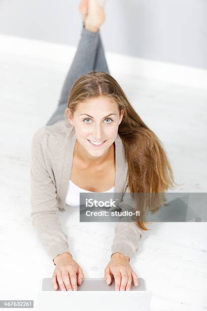 Woman Working On A Laptop Stock Photo - Download Image Now - Adult, Beautiful People, Beauty