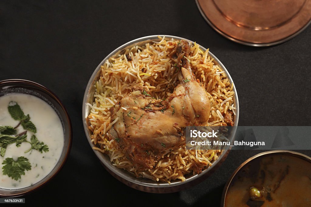 Hyderabadi Biryani - A Popular Chicken or Mutton dish Hyderabadi Biryani - is perhaps the most well-known Non-Vegetarian culinary delights from the famous Hyderabad Cuisine. It is a traditional dish made using Basmati rice, goat meat and various other exotic spices. Biryani Stock Photo