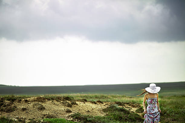 istock Young woman walking 467633944