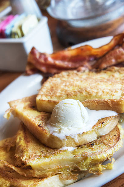 French toast French toast with butter, and bacon french toast bacon bread butter stock pictures, royalty-free photos & images