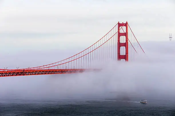 Photo of Golden Gate Bridge and cruise with low fog,  San Francisco