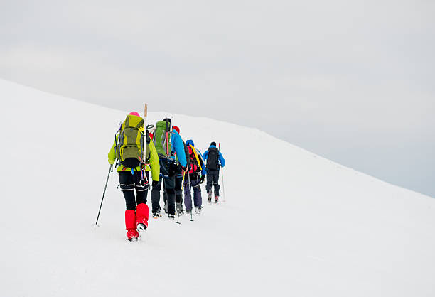 istock Mountaineers walking on mountain. 467635808