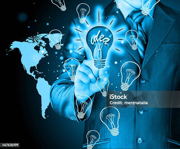 Business Man Touching Light Of Idea Stock Photo - Download Image Now - Adult, Adults Only, Animal Body Part