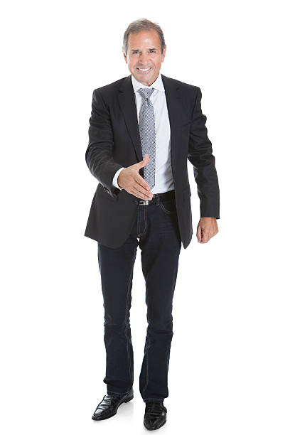 istock Happy Business Man Offering Handshake 467637261
