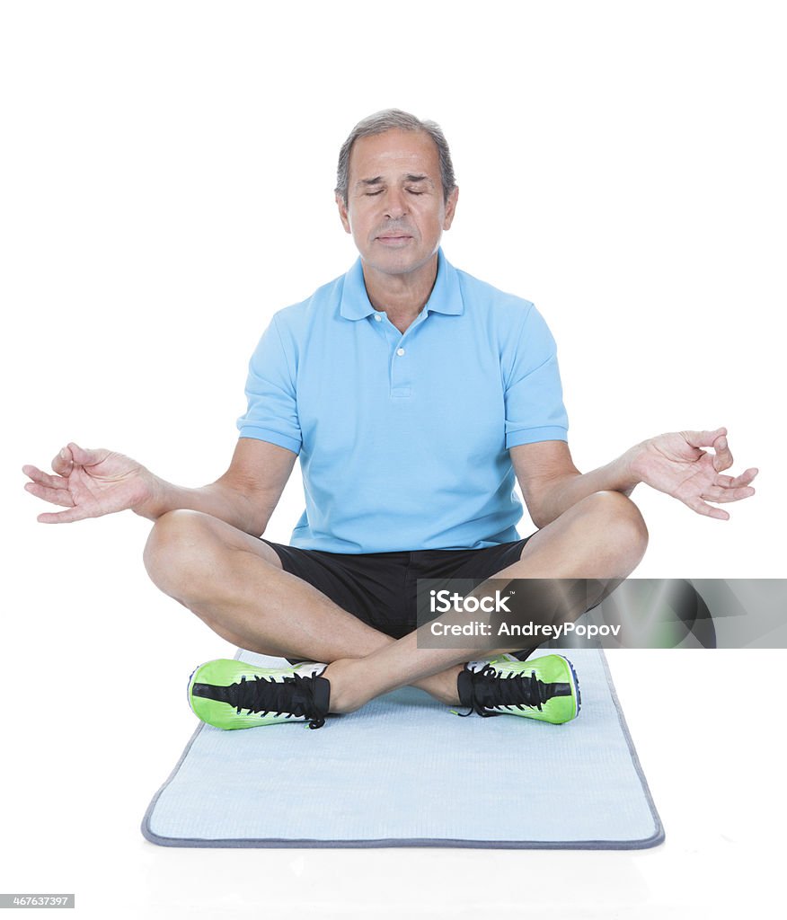 Mature Man Doing Yoga Mature Man Practicing Yoga In The Lotus Position Over White Background Active Lifestyle Stock Photo