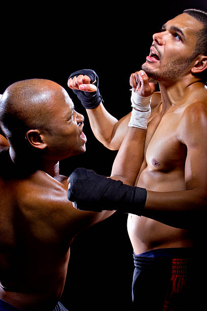 istock Black and Latino Boxers or MMA Fighters Sparring 467638624
