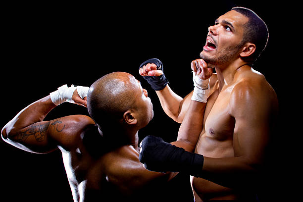 istock Black and Latino Boxers or MMA Fighters Sparring 467638634