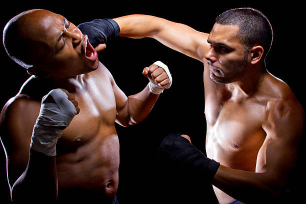 istock Black and Latino Boxers or MMA Fighters Sparring 467638656