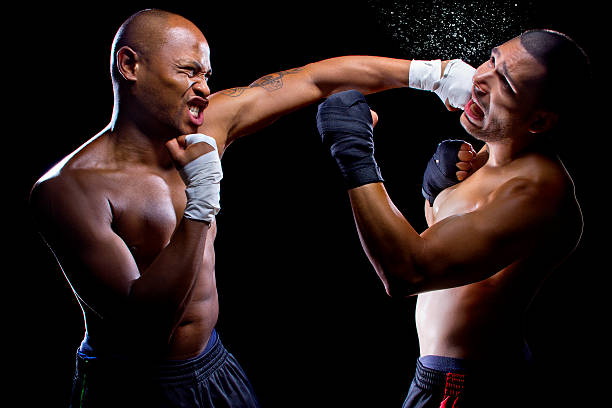 istock Black and Latino Boxers or MMA Fighters Sparring 467638702