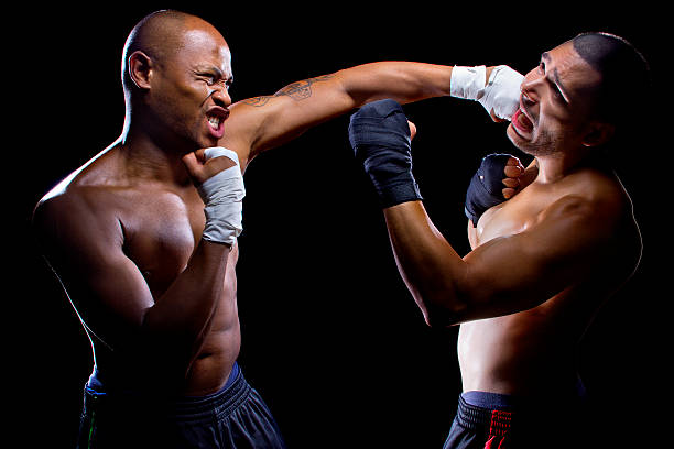 istock Black and Latino Boxers or MMA Fighters Sparring 467638712