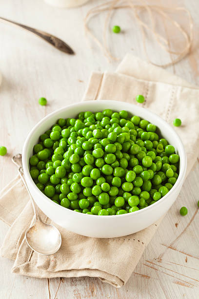 istock Organic Steamed Fresh Green Peas 467639442