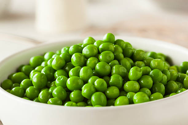 istock Organic Steamed Fresh Green Peas 467639446