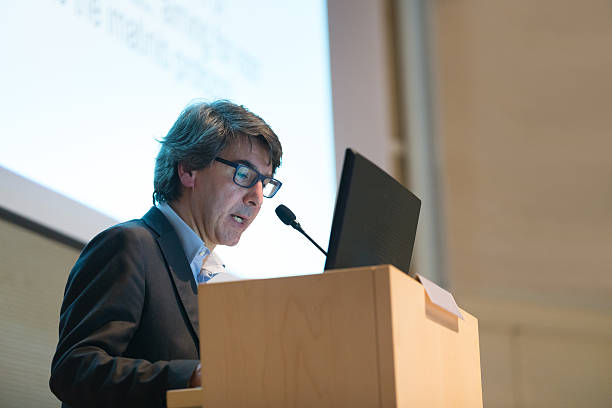 istock Speaker giving talk on podium at Business Conference. 467639762