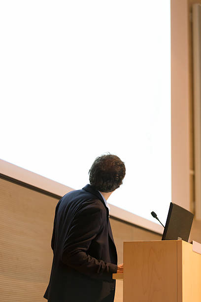 istock Speaker giving talk on podium at Business Conference. 467639764