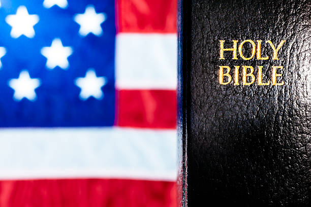 istock Holy Bible and American flag 467640112