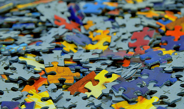 istock Pile of scattered puzzle pieces 467641164