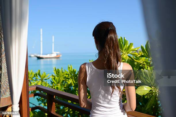 Woman Looking Seascape On Balcony Stock Photo - Download Image Now - Adult, Adults Only, Balcony