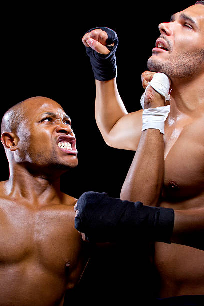 istock Black and Latino Boxers or MMA Fighters Sparring 467643440