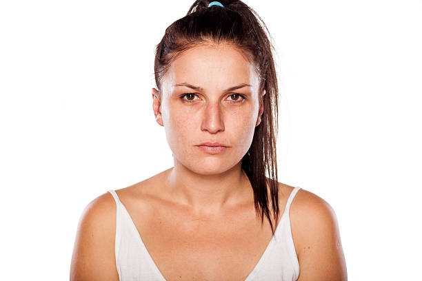 istock Serious natural young woman posing without makeup 467643728