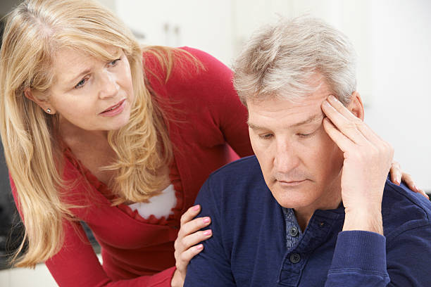 istock Mature Woman Comforting Man With Depression 467644852