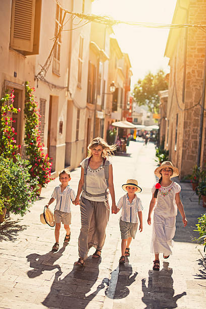istock Family visiting mediterranean town. 467645550
