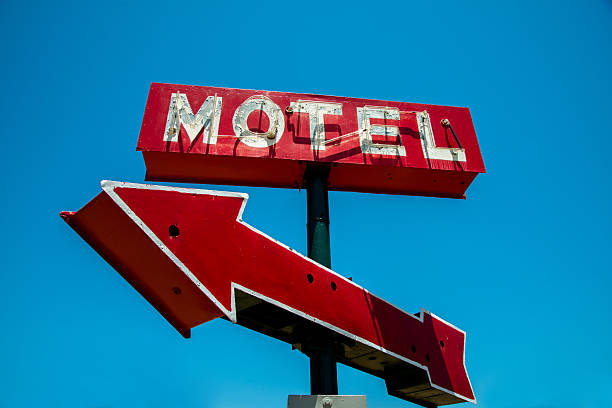 istock Vintage, neon hotel sign with a red arrow 467645822