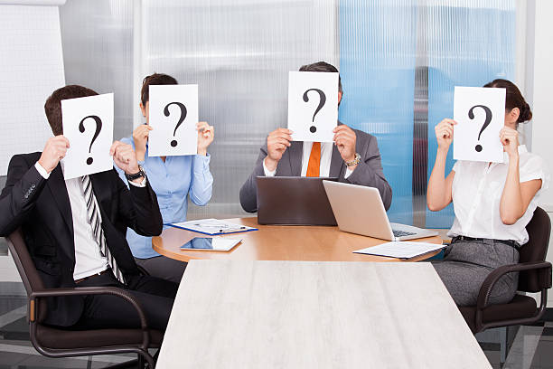 istock Businesspeople Holding Question Mark Sign 467645973