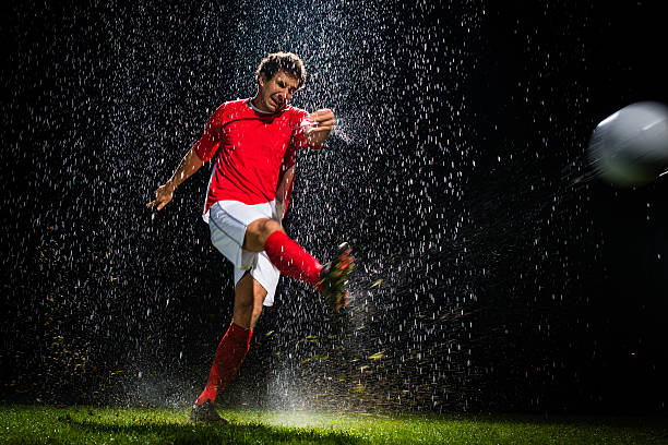 istock Soccer Player Kicking A Ball 467647130