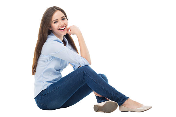 istock Casual woman sitting over white background 467647198