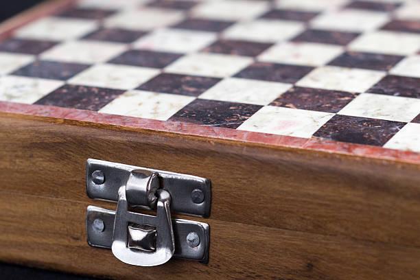 istock Close-up of a wood and stone chess box 467647440