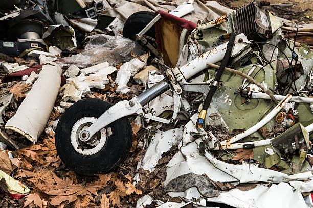 parts of an airplane Macedonia, Skopje - January 18, 2014: Some broken parts of a small airplane are thrown on the ground for metal scrap in SKopje Macedonia airplane crash photos stock pictures, royalty-free photos & images