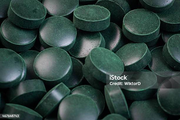 Green Pills Spirulina Stock Photo - Download Image Now - Algae, Backgrounds, Chlorella