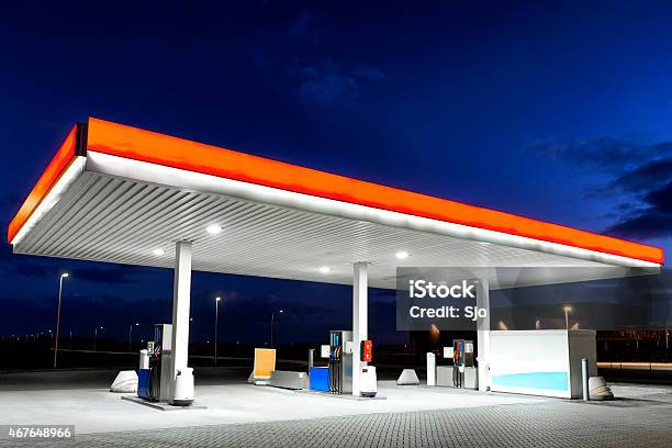Retail Gasoline Station At Night Stock Photo - Download Image Now - Gas Station, 2015, Built Structure