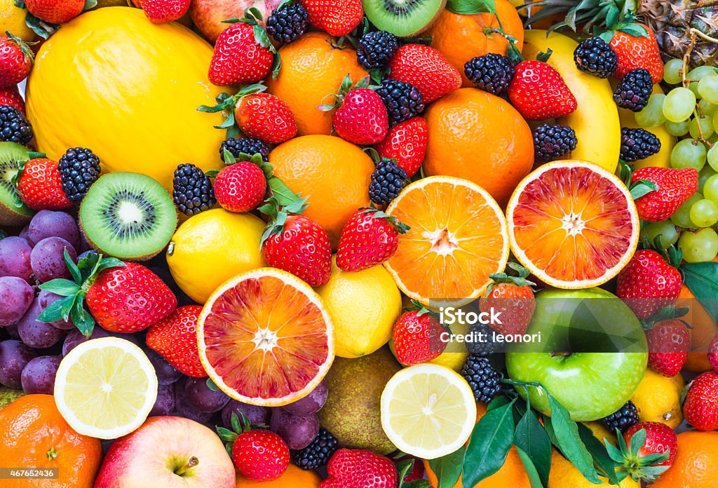 Fresh mixed fruits. Fresh mixed fruits background.Organic fruits multicolore background. Fruit Stock Photo
