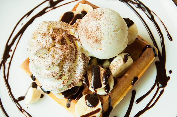 istock Waffles with chocolate sauce, ice cream, banana 467653826
