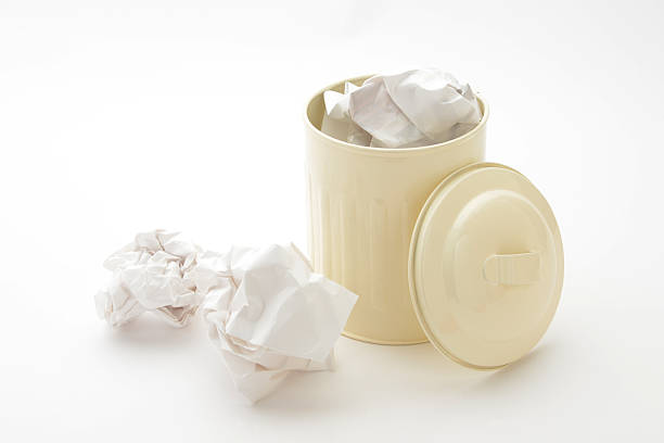 istock Paper trash and trash can on white background 467657150