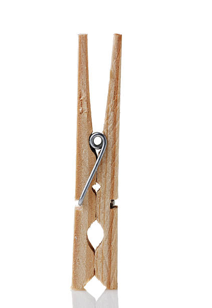 istock Wooden clothespin. isolated on white 467657332