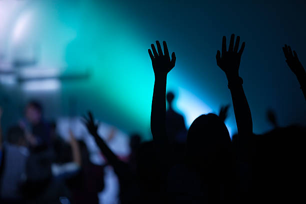 istock christian music concert with raised hand 467657522