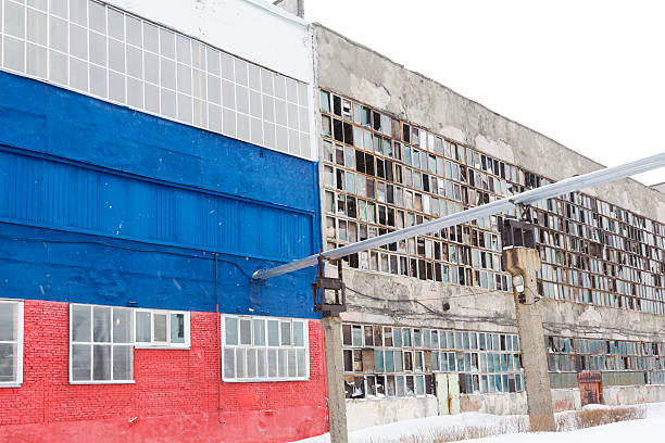 istock background of old broken windows. Russian flag on the wall 467657570