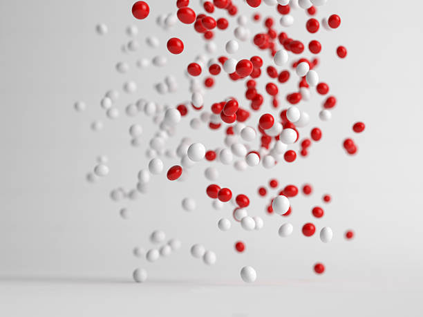 istock Red and white balls moving in the air 467657714