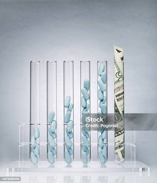Pharmaceutical Research Costs Stock Photo - Download Image Now - Currency, Laboratory, Healthcare And Medicine