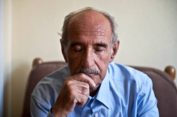 istock Elderly Man Portrait With Eyes Closed 467659055
