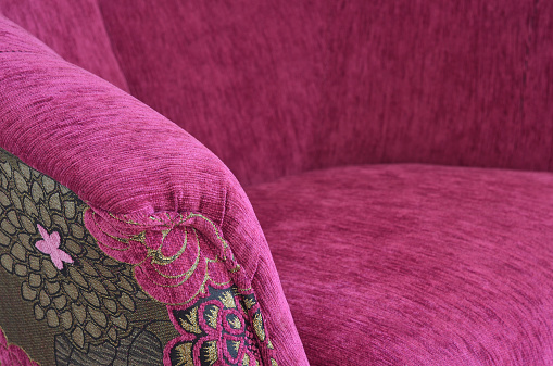 Detail of purple cloth armchair