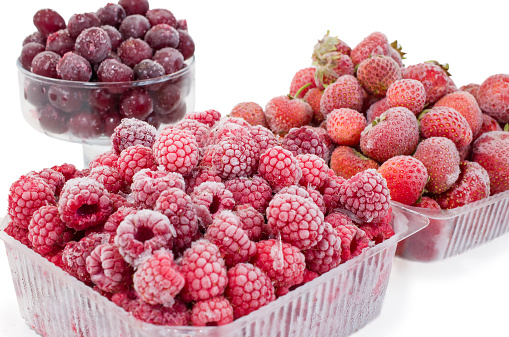 frozen strawberries, cherry and raspberries. Selective focus