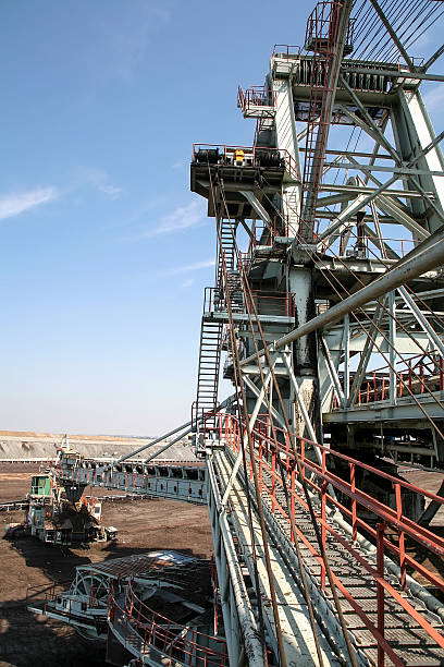 istock Large excavators in coal mine, aerial view 467660302