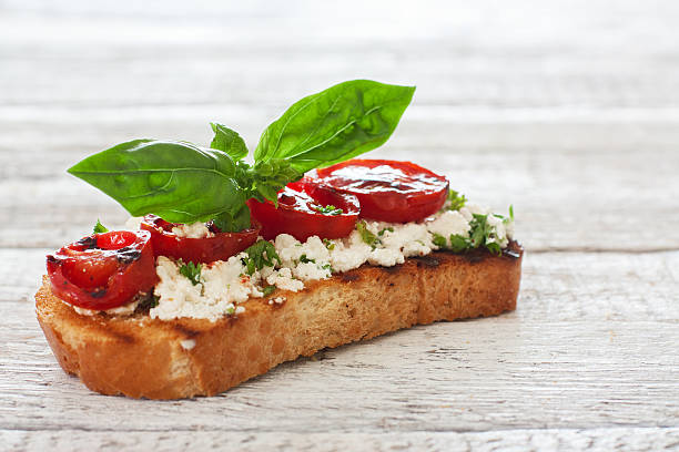 istock Toast with grilled tomatoes and soft cheese 467662637