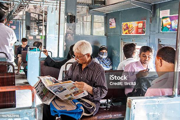 People Travelling On Local Mumbai Train Stock Photo - Download Image Now - Mumbai, India, Newspaper